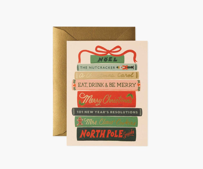 Christmas-themed card with decorative text and a gold envelope on a white background
