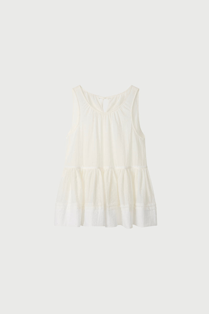 A white peplum blouse on a white background