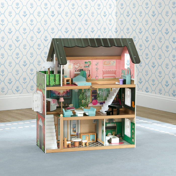 Wooden dollhouse with detailed interior on a neutral background