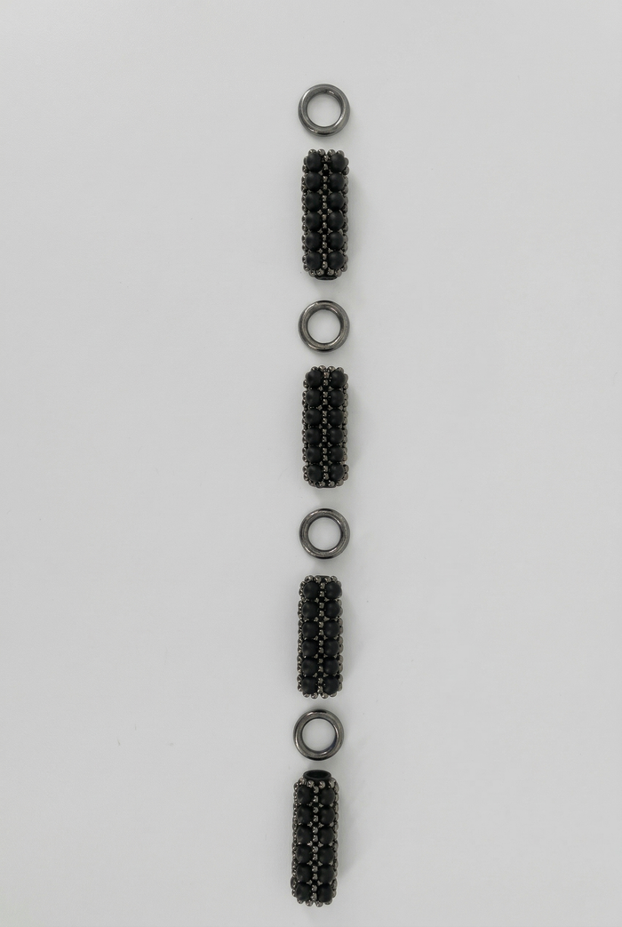macro detail of delicate beaded link construction of beaded link jet black by Object & Dawn