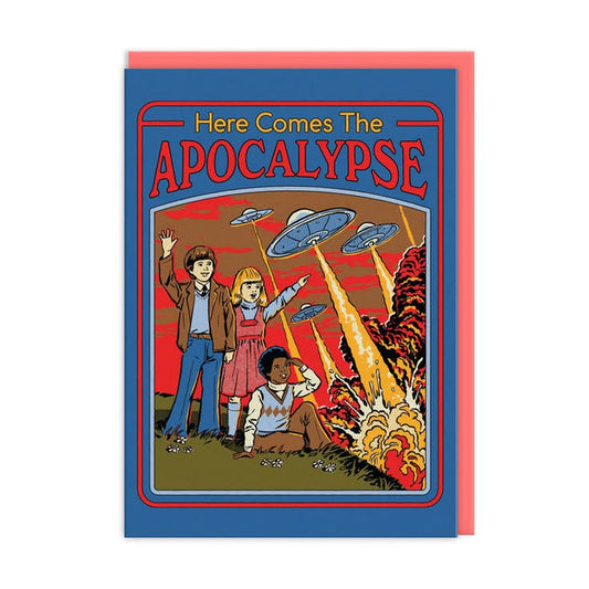 A retro-style illustrated greeting card with a blue border and the title 'Here Comes The APOCALYPSE' in red and yellow. The card shows three children facing fiery destruction, with flying saucers overhead, and is shown with a pink envelope behind it on a white background.