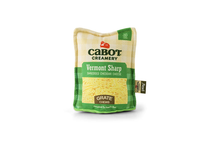 Cabot Creamery x Play Vermont Cheddar Shredder inspired by a bag of shredded cheese on a white background