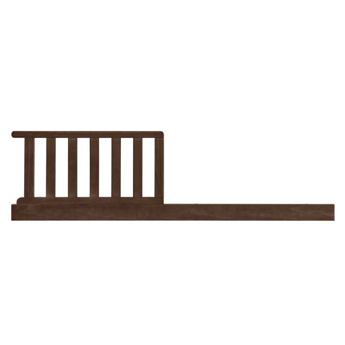 A brown wooden guardrail kit, likely designed to be attached to a crib or bed frame.