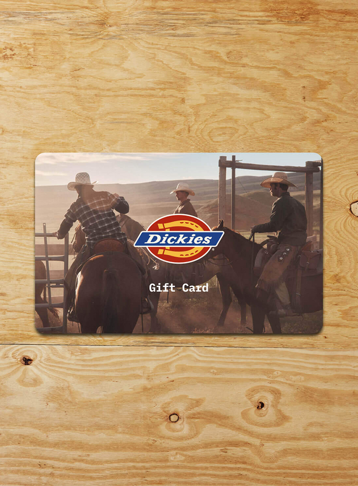 Dickies gift card featuring three cowboys on horseback with the Dickies logo and "Gift Card" text on wooden background.