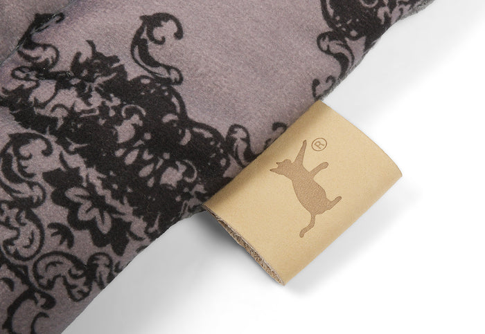 P.L.A.Y. Feline Frenzy Cat Nap Pad close up of tag