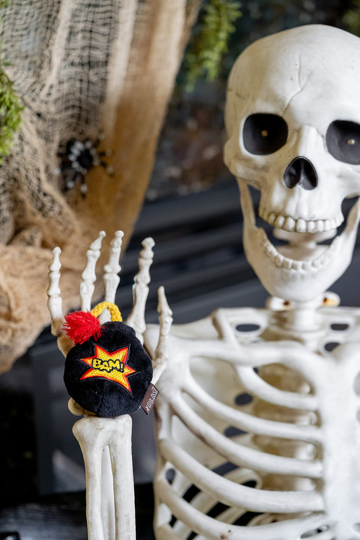 P.L.A.Y. Feline Frenzy Killer Cat Kitty-Boom Toy Set - bomb toy in skeleton's hand ready to be launched