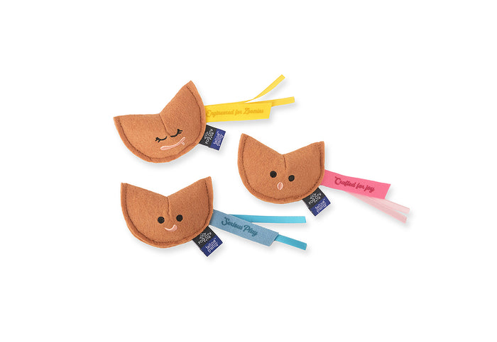 Three Fog City Pet x Feline Frenzy Fortune Whiskers toys with colorful ribbons on a white background