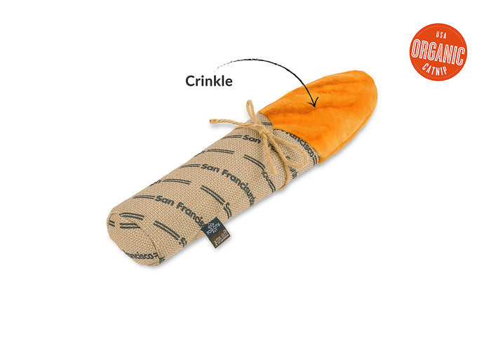 Feline Frenzy Fog City Pet x P.L.A.Y. Fur-mented Loaf Kicker Toy wrapped in burlap with 'San Francisco' label on a white background with features pointed out