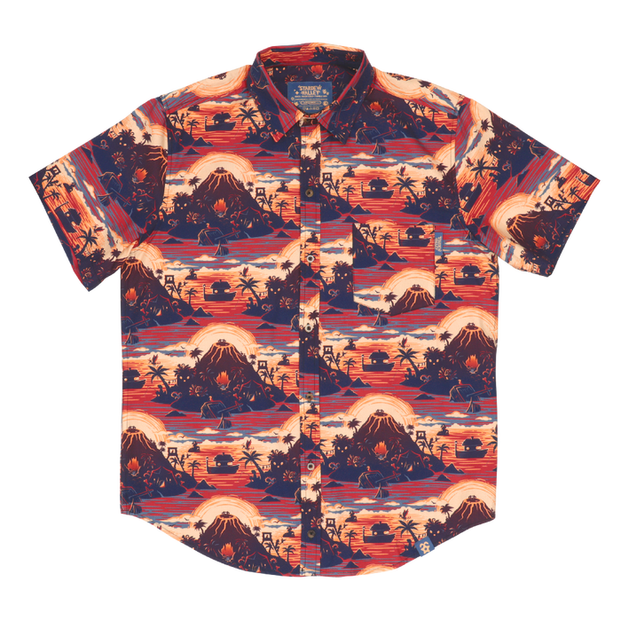 A short-sleeve button-up Stardew Valley shirt with a repeating Ginger Island pattern in sunset colors—bronze, orange, red. It has a chest pocket.