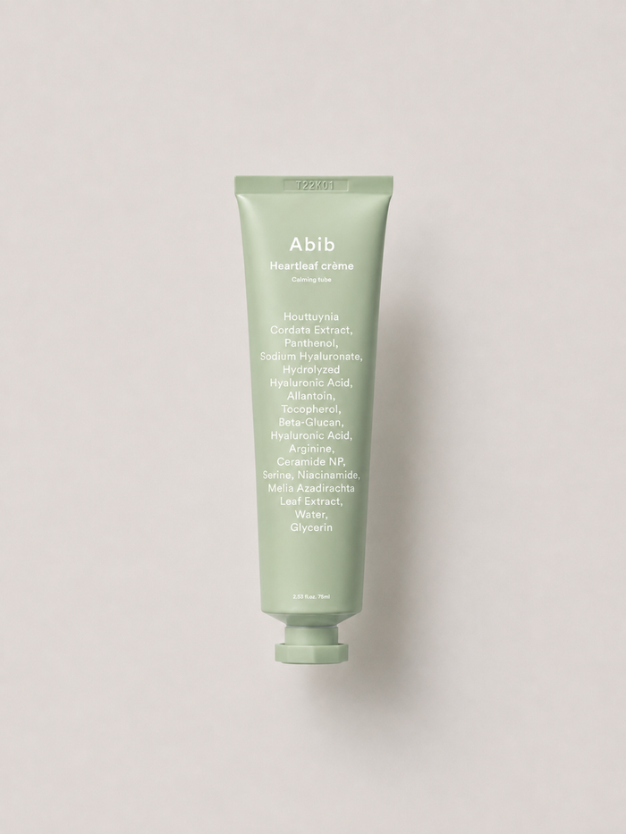 A korean skincare cream - Abib Calming Tube heartleaf Creme in a light sage green squeeze tube centered against a neutral light gray background. 75 ml.