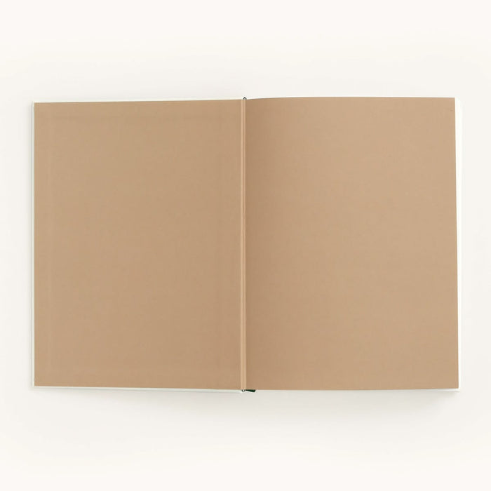 Open beige notebook on a white background
