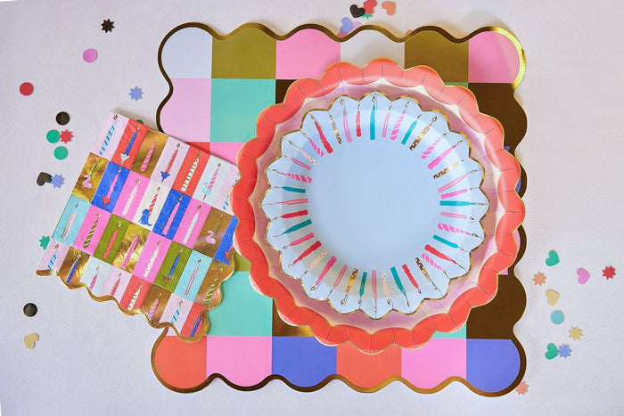 Decorative paper plates with colorful patterns on a white background
