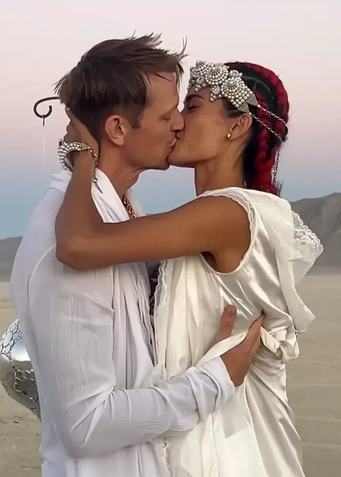 Couple Bridal wear white lace robe with handcrafted Mata Hari Bracelet Ring and Khutulun beaded Top Harness with Pearl Beaded Crown by object and dawn