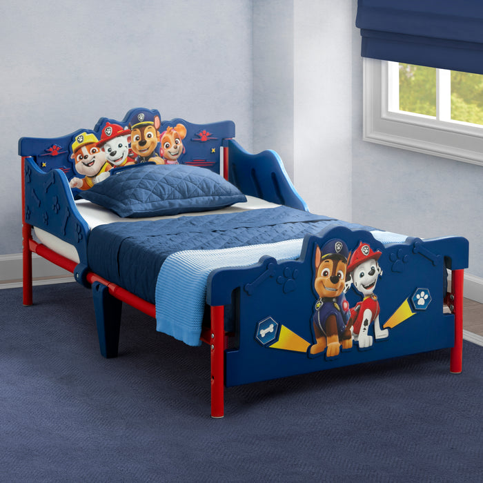 Children's bed with Paw Patrol design in a room with a window.