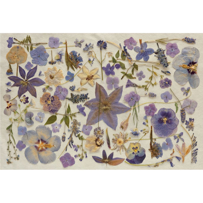 Decorative mat with pressed flowers and plants on a beige background