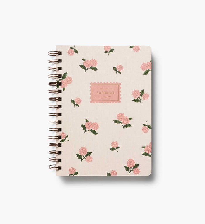 Notebook with floral pattern on a white background