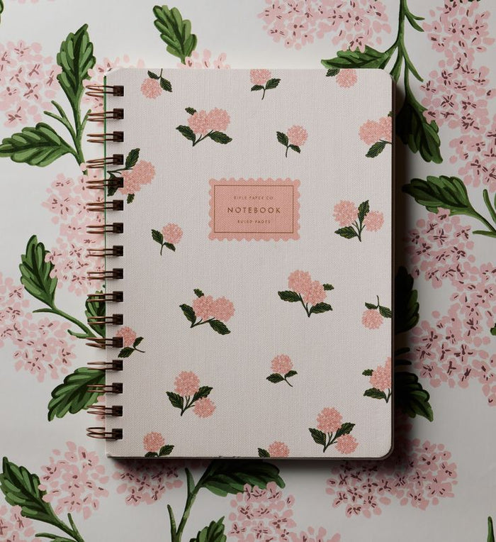 Floral notebook on a floral background