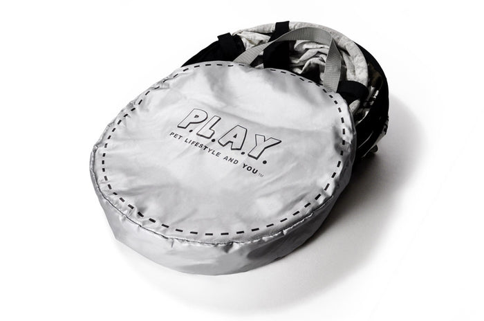 P.L.A.Y. Tunnel silver travel case shown