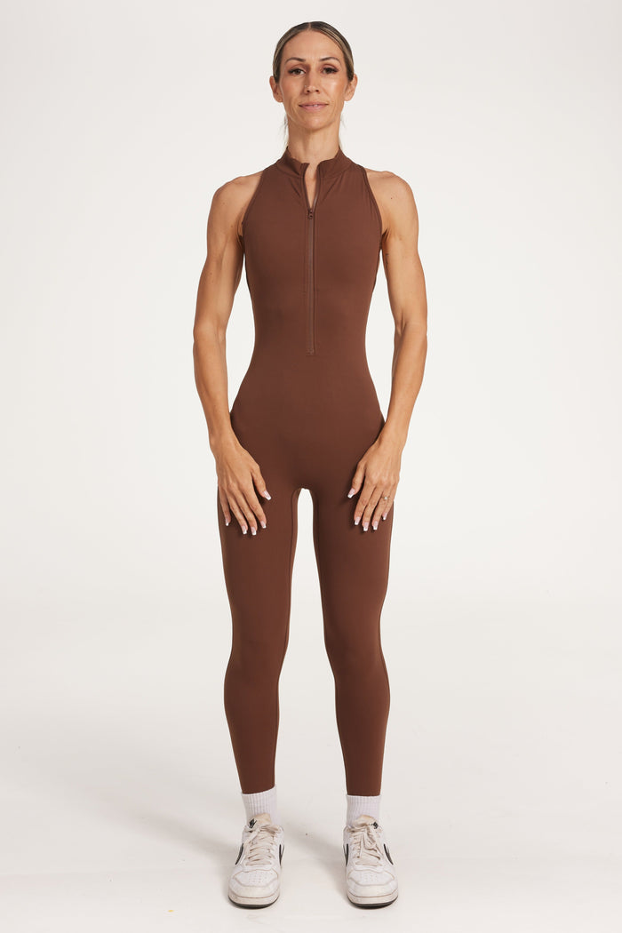 full leg length bodysuit in buttery soft fabric with half zipper, high neck design, scrunch butt, and open back detail.