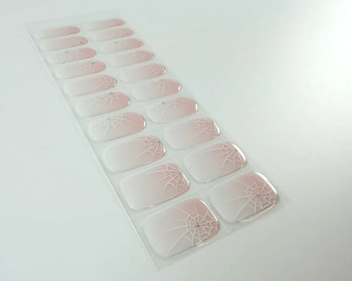 Pink Widow semi-cured gel nail wraps, angled view
