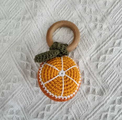 Split Orange Rattle Teething Toy
