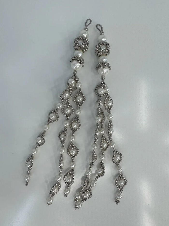 ghost image handcrafted modular trinity medallions in pearl by object and dawn