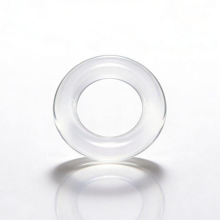 Close-up product view of the Universal Super-Stretch Cock Ring highlighting the soft clear material and thick stretchable construction for enhanced support and comfort