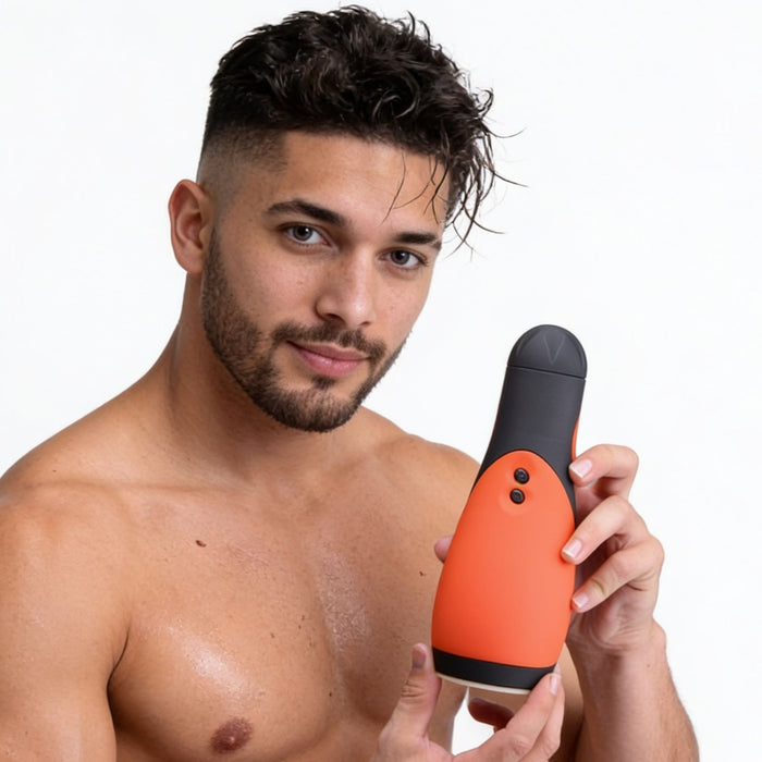 Model holding the Vibra Head Bionic Auto Stroker to demonstrate the compact size, ergonomic shape, and easy handheld use