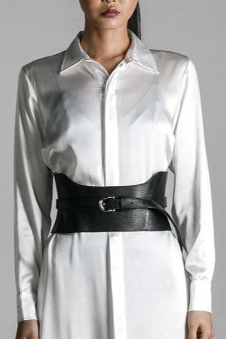 woman wears anais long sleeve silk shirt dress with corset belt by object & dawn close up